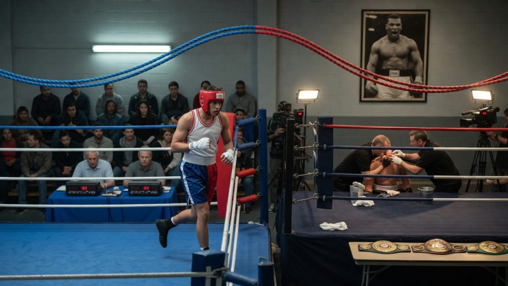 Editorial split-scene photo of a boxer stepping from an amateur ring into a professional