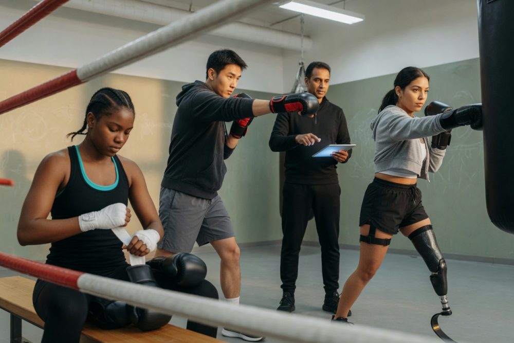 Alternative concept: Photographic top-down shot inside a boxing ring. At center on the clean